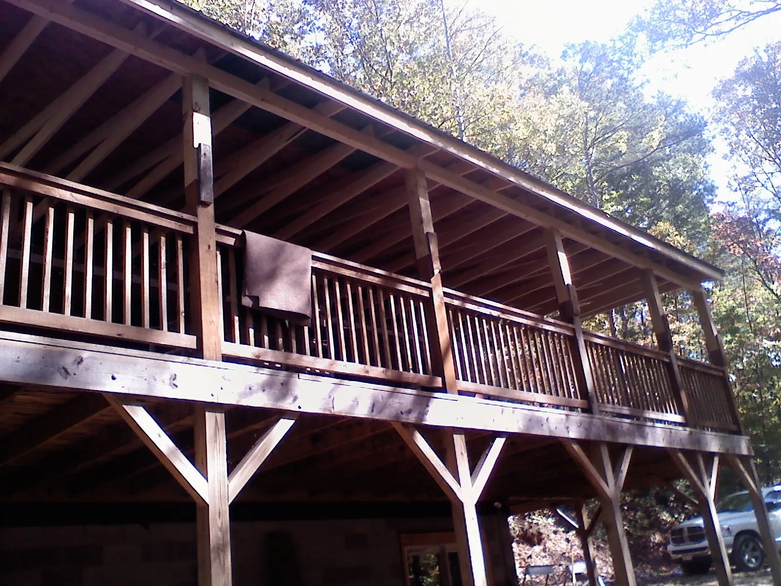 Timber framing under a new elevated porch and deck — Roof Leak Repair in Calhoun City by Roofing Brothers